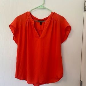 A Banana Republic red blouse